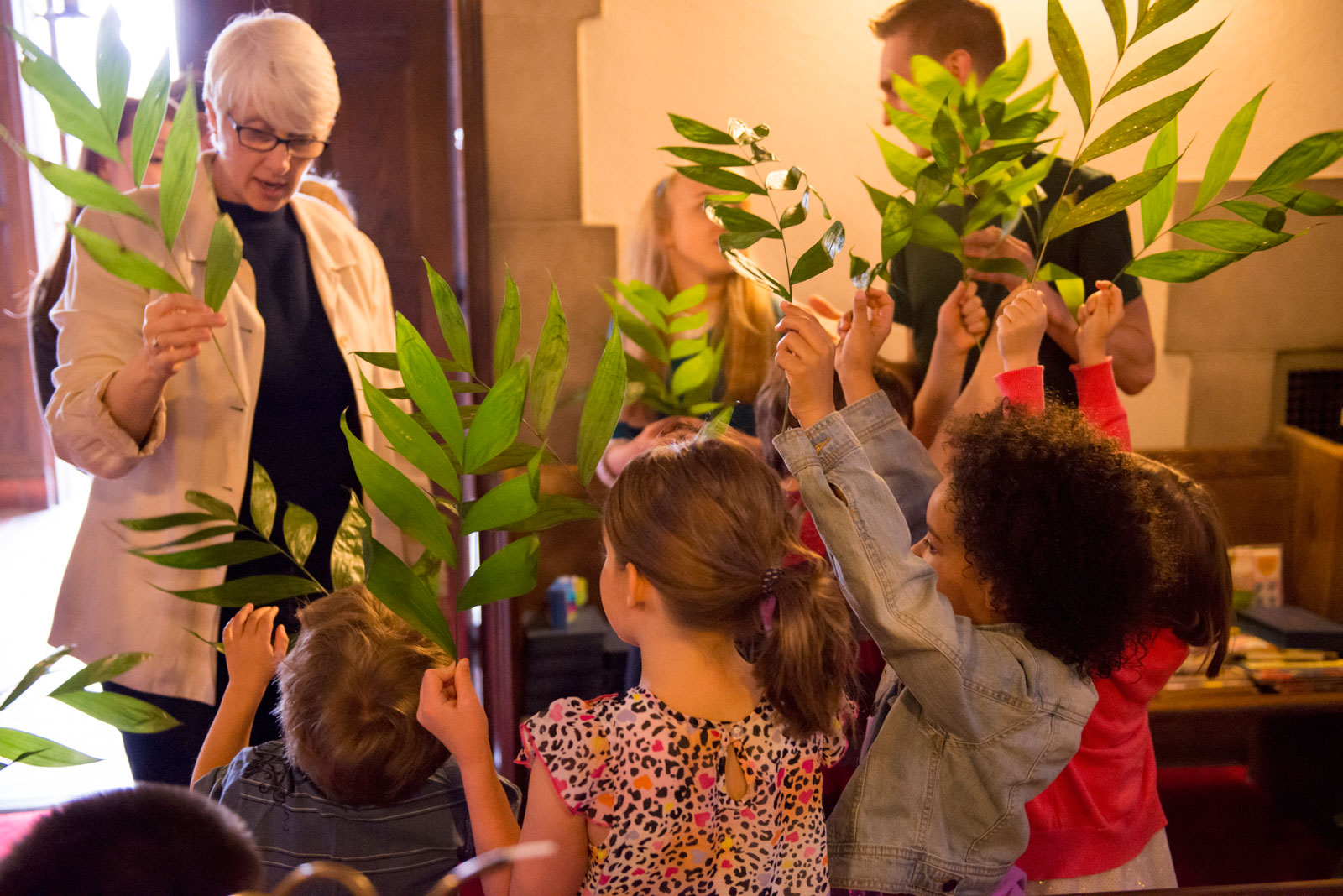 youth with palms on Palm Sunday