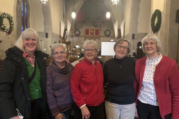 Five women standing together in the Sanctuary