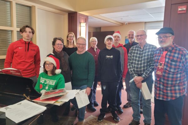 group posing at Christmas time
